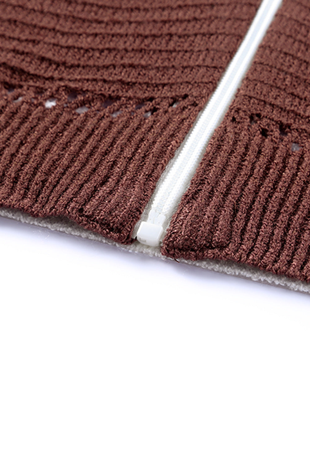 Brown knit cardigan sleeve cuff detail with ribbed trim and openwork pattern