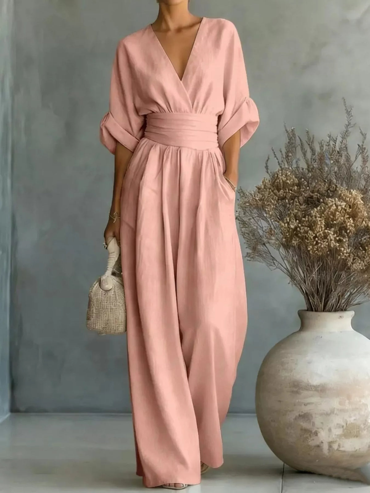 Blush pink ruched-waist wide-leg jumpsuit with V-neck and half sleeves