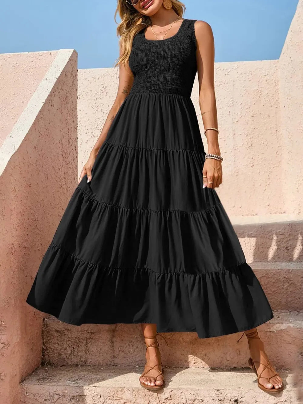 Black tiered smocked wide-strap dress with tiered ruffle skirt