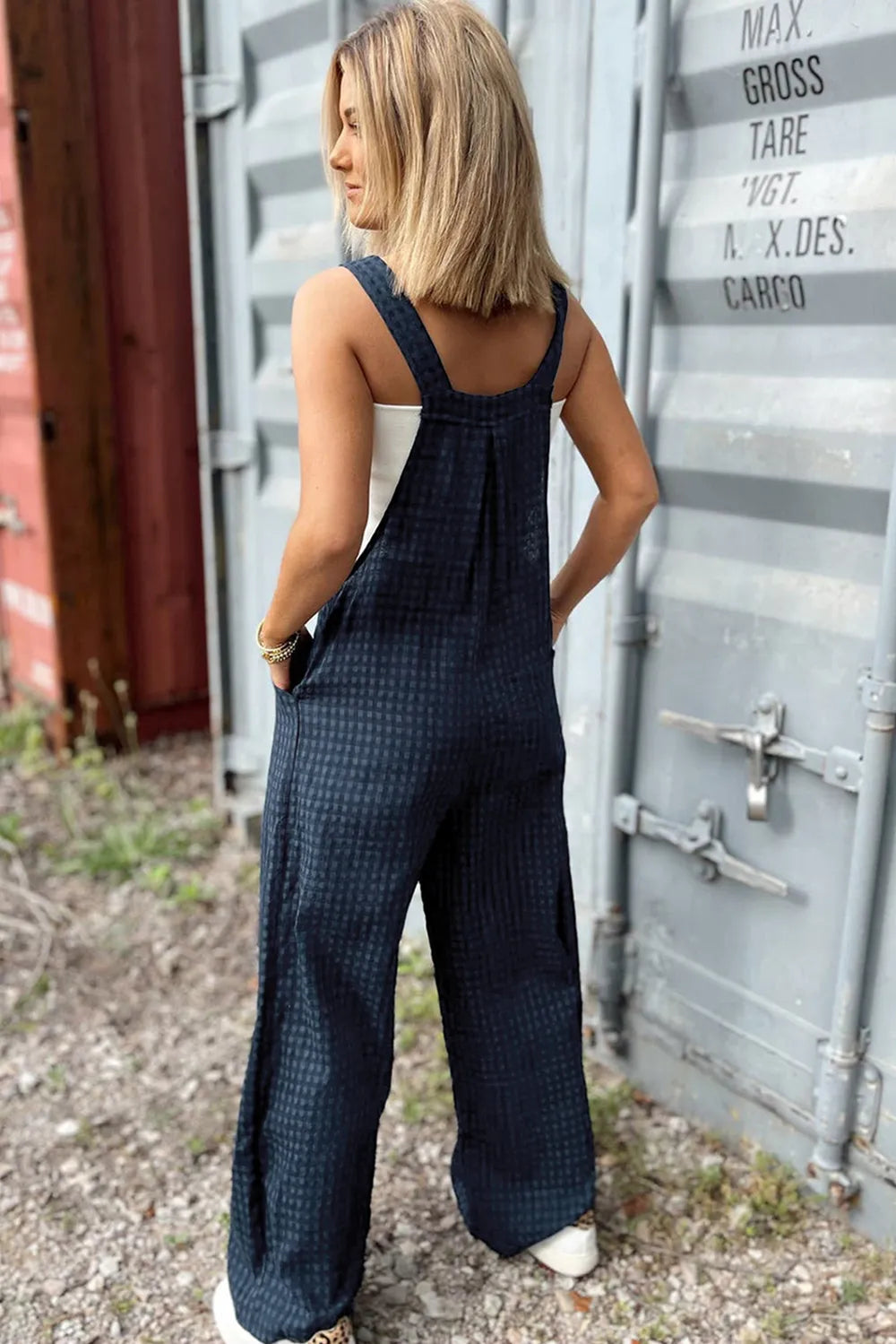 Dark blue plaid wide-back overalls with wide straps and full-length legs