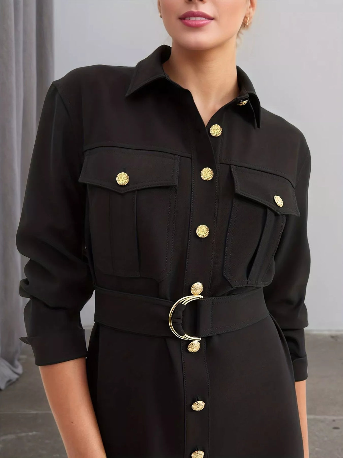 Black long-sleeve midi dress with flap chest pockets, gold buttons, belted waist