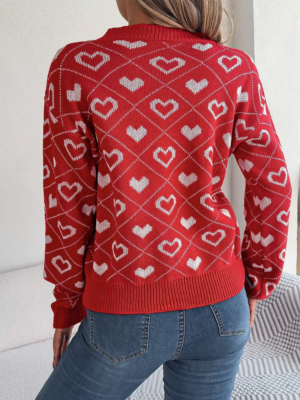 Deep red heart-pattern knit sweater, long sleeves, back view