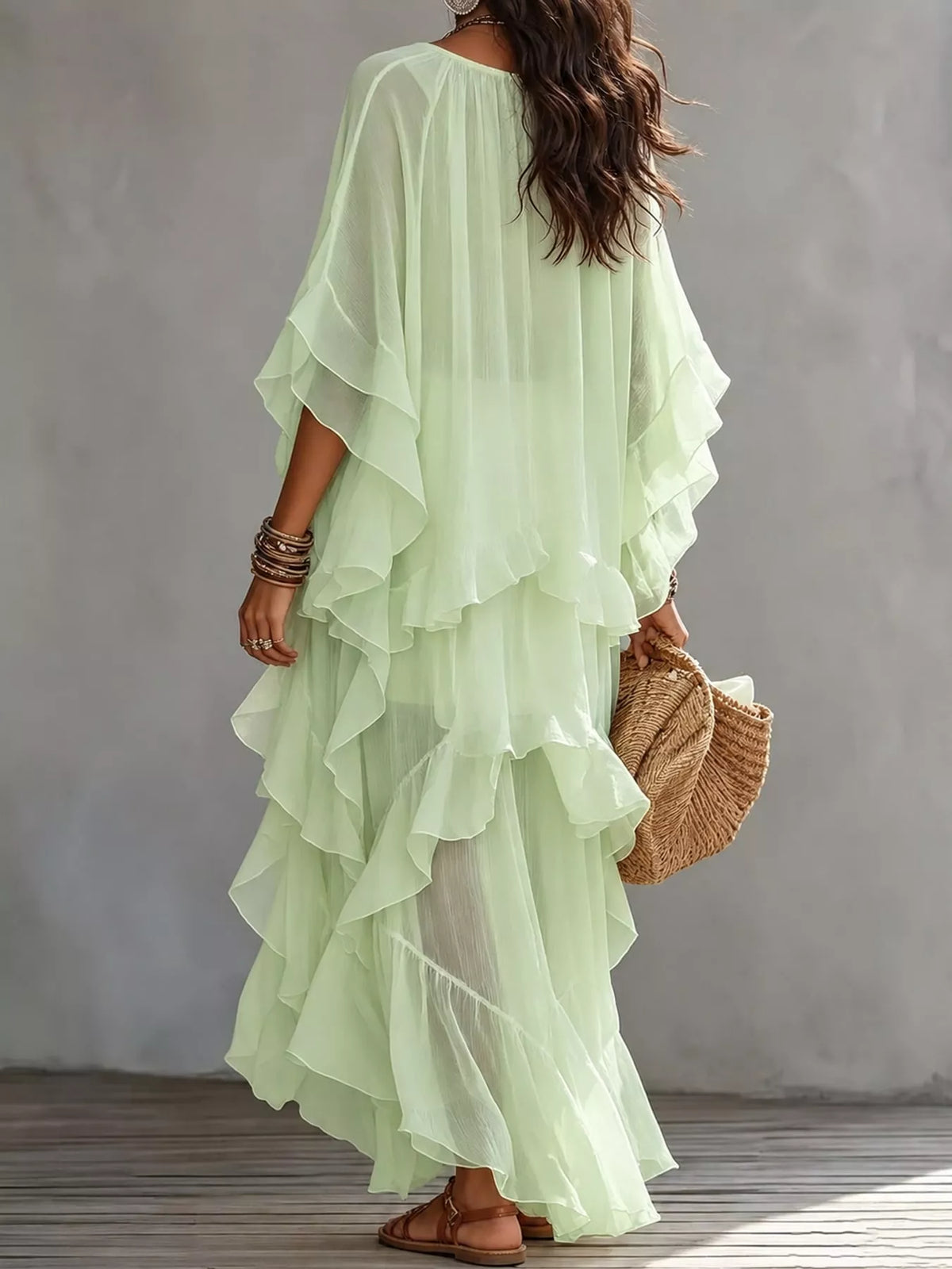 Light green tiered maxi dress with layered ruffle back and flutter sleeves