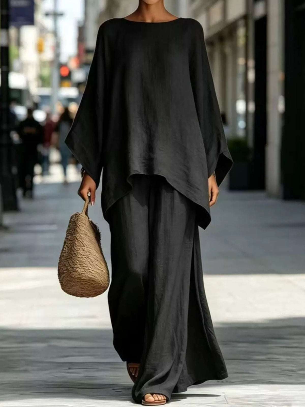 Two-piece batwing top and wide-leg pants set, black draped batwing tunic and matching pants