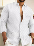 Men's button-up long-sleeve shirt, textured white with chest pocket and button placket