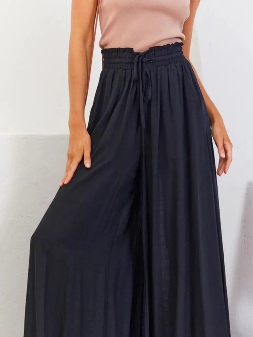 High waist wide leg pants in dark navy with elastic waistband and gathered drawstring