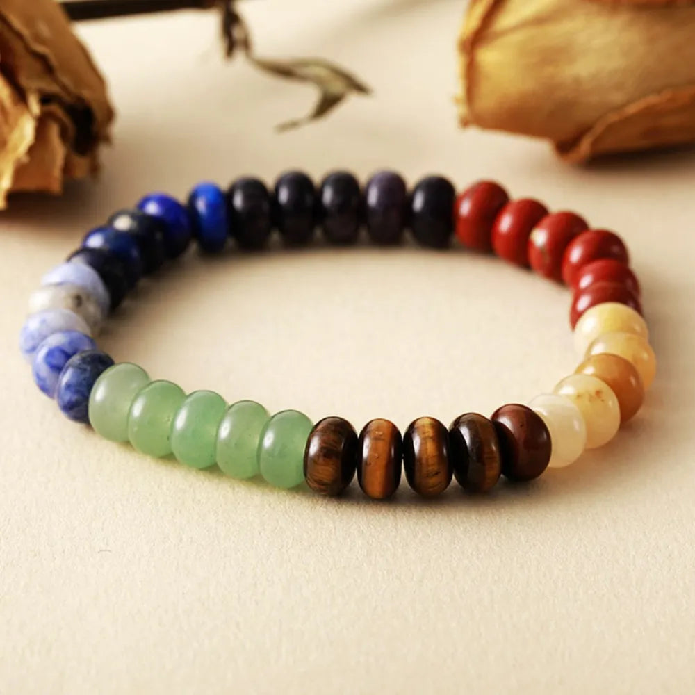 Multicolor natural stone bead bracelet with blue, green, red, black, and cream beads