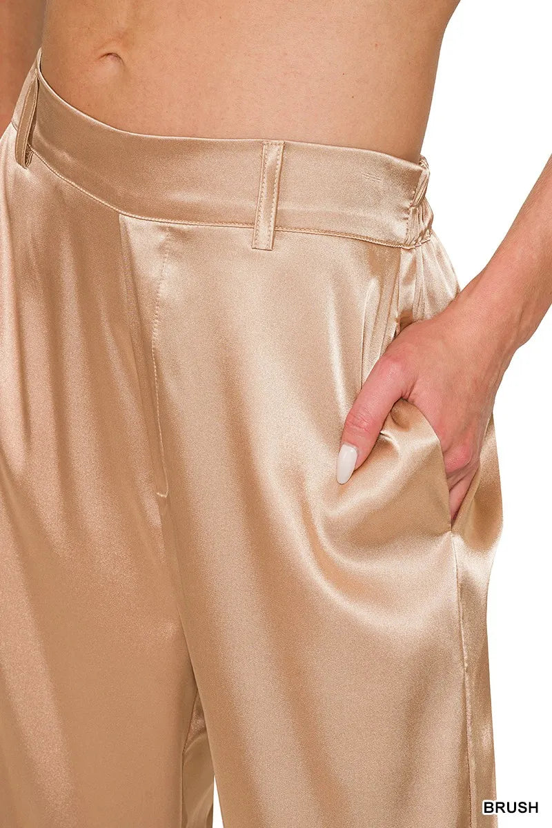 Satin wide-leg pants close-up: brush nude front pocket and waistband