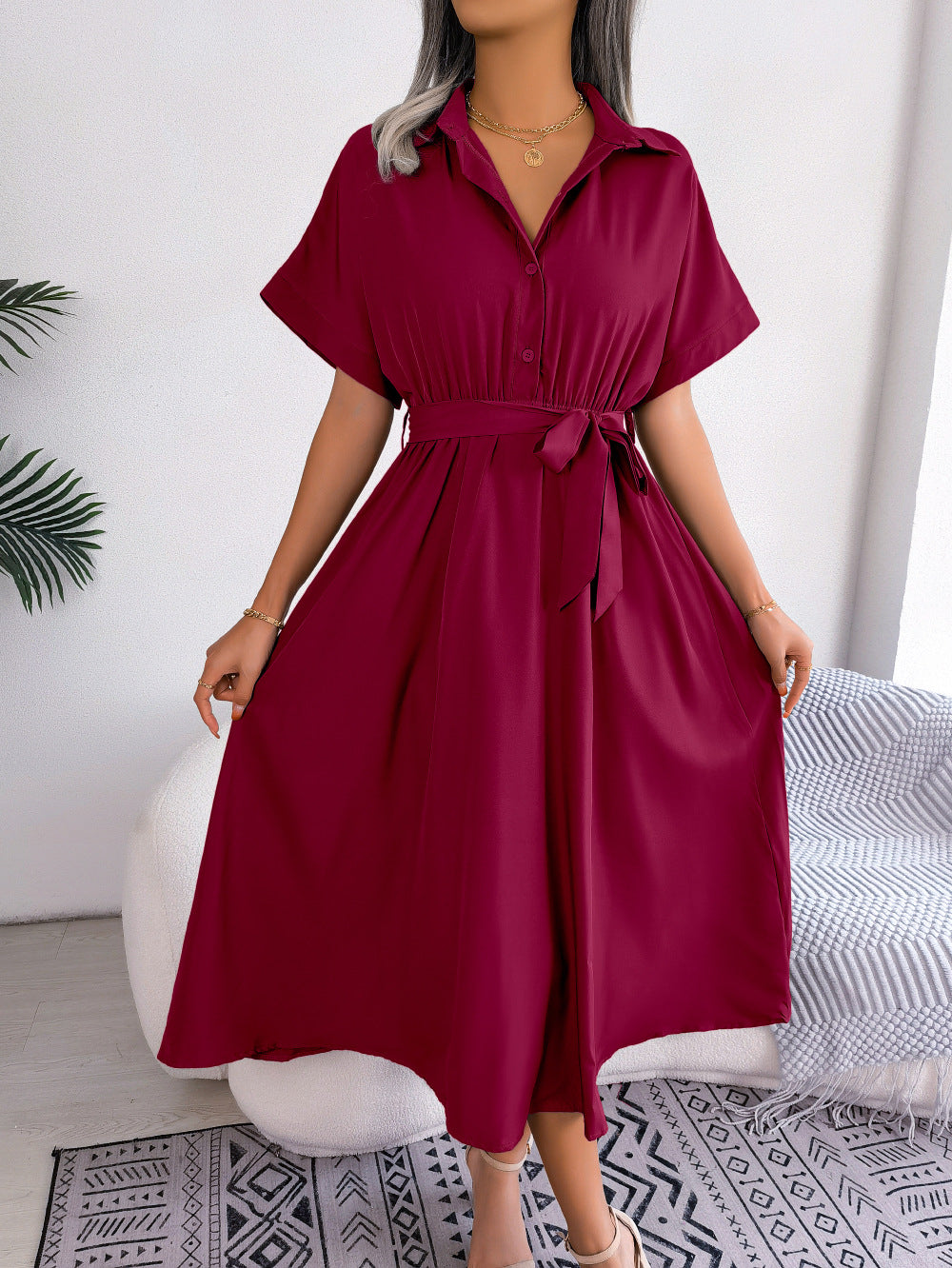 Burgundy short-sleeve collared tie belt dress with button front and midi length