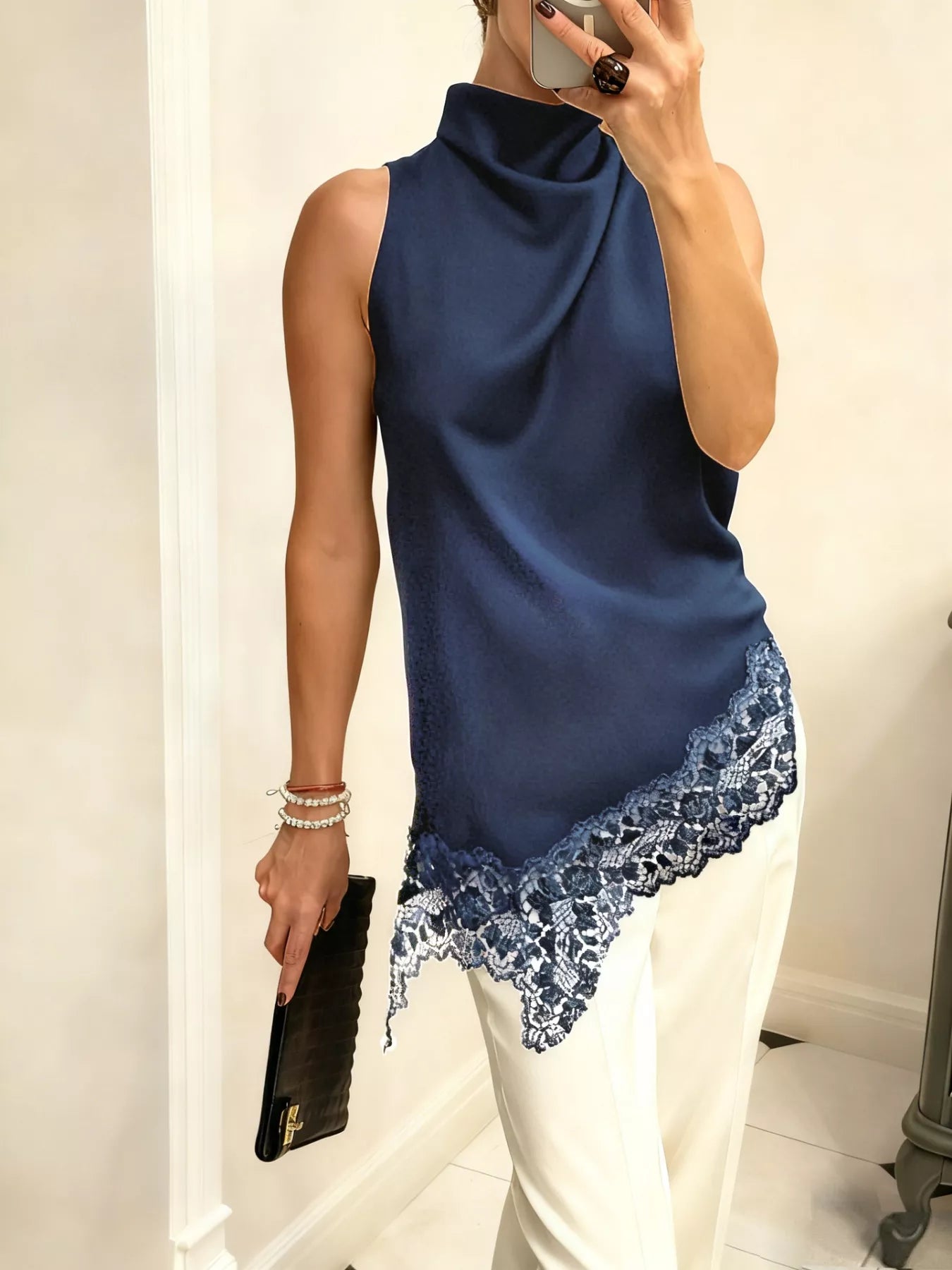 Cedar & Moore Navy blue high-neck lace-trim cami with asymmetrical hem by Trendsi