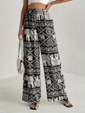 Black printed wide-leg pants with elephant pattern, elastic waist and drawstring