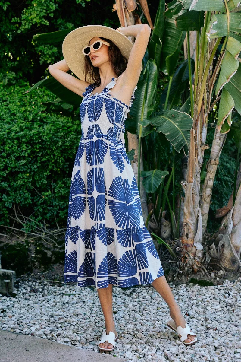 Tiered midi dress with navy abstract print on white, smocked bodice, sleeveless