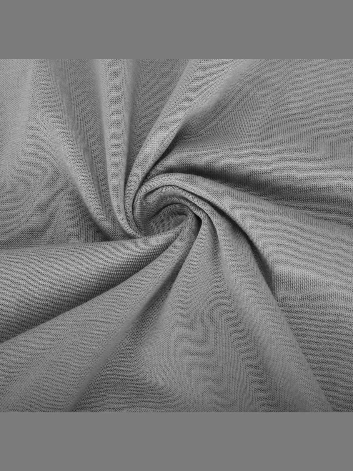 Gray knit fabric close-up with soft drape and folded texture