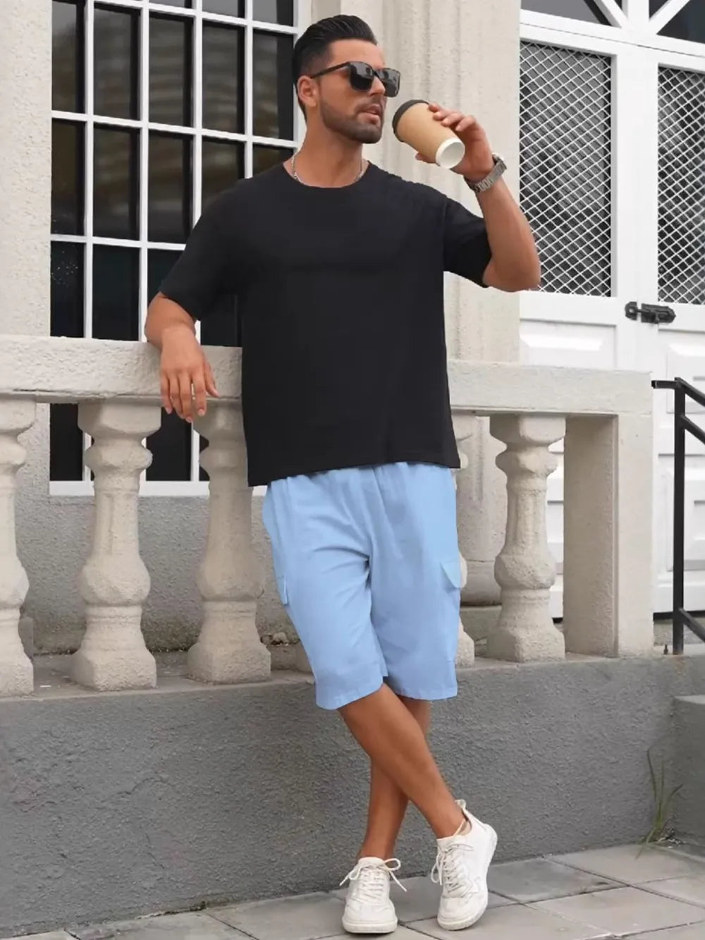 Men's black cargo drawstring shorts with elastic waistband and side cargo pocket