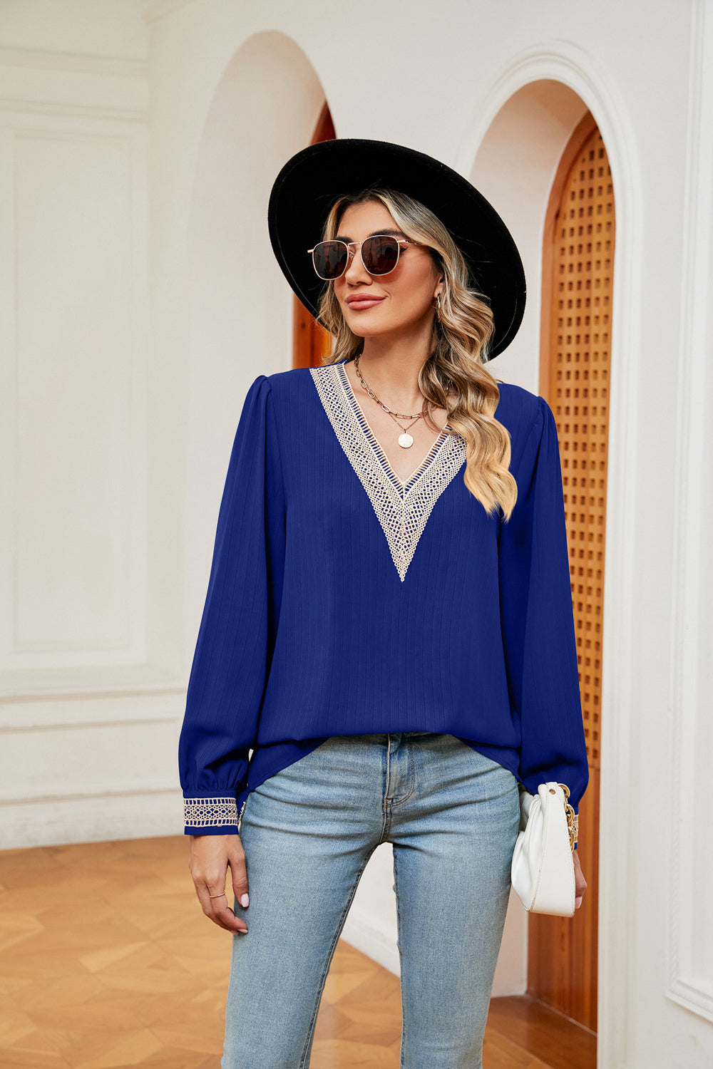 Royal blue contrast V-neck puff sleeve blouse with lace-trim cuffs