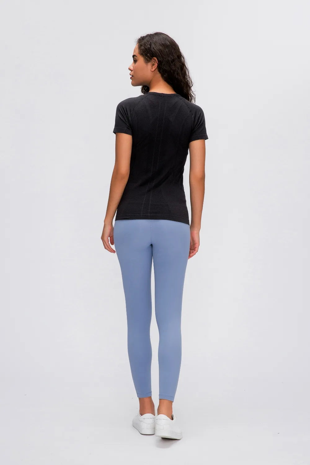 Black round-neck short-sleeve active t-shirt, back view.
