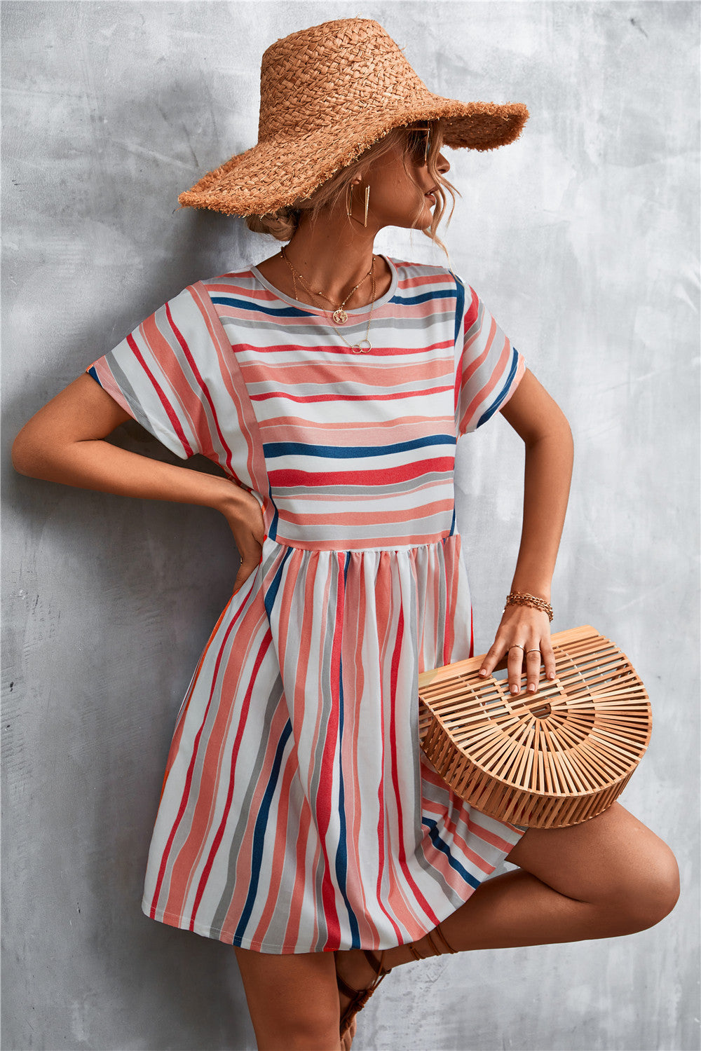 Striped round-neck dress with short sleeves and gathered waist, vertical multi-color stripes