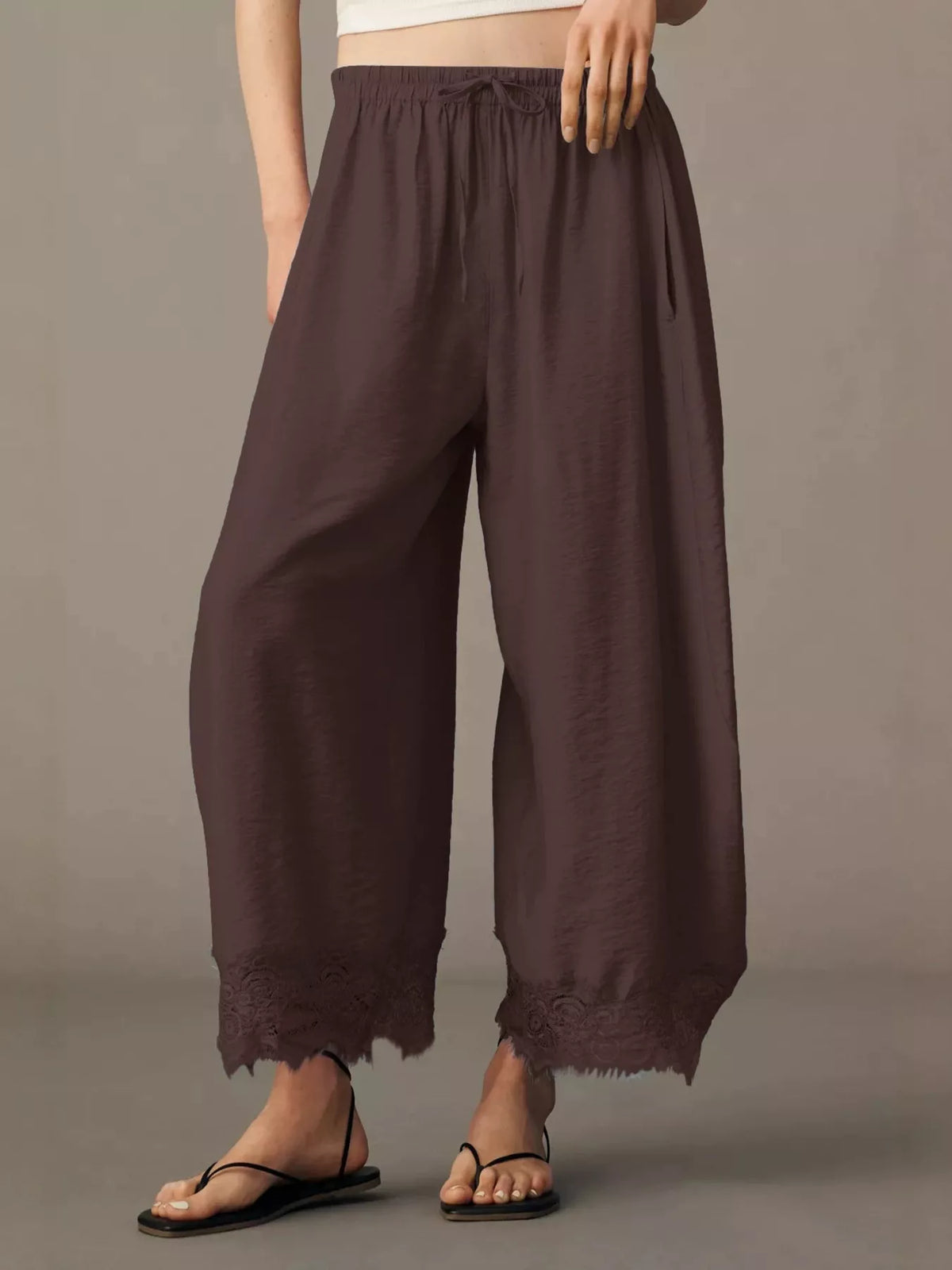 Dark brown wide-leg casual pants with drawstring waist and lace-trim cuffs