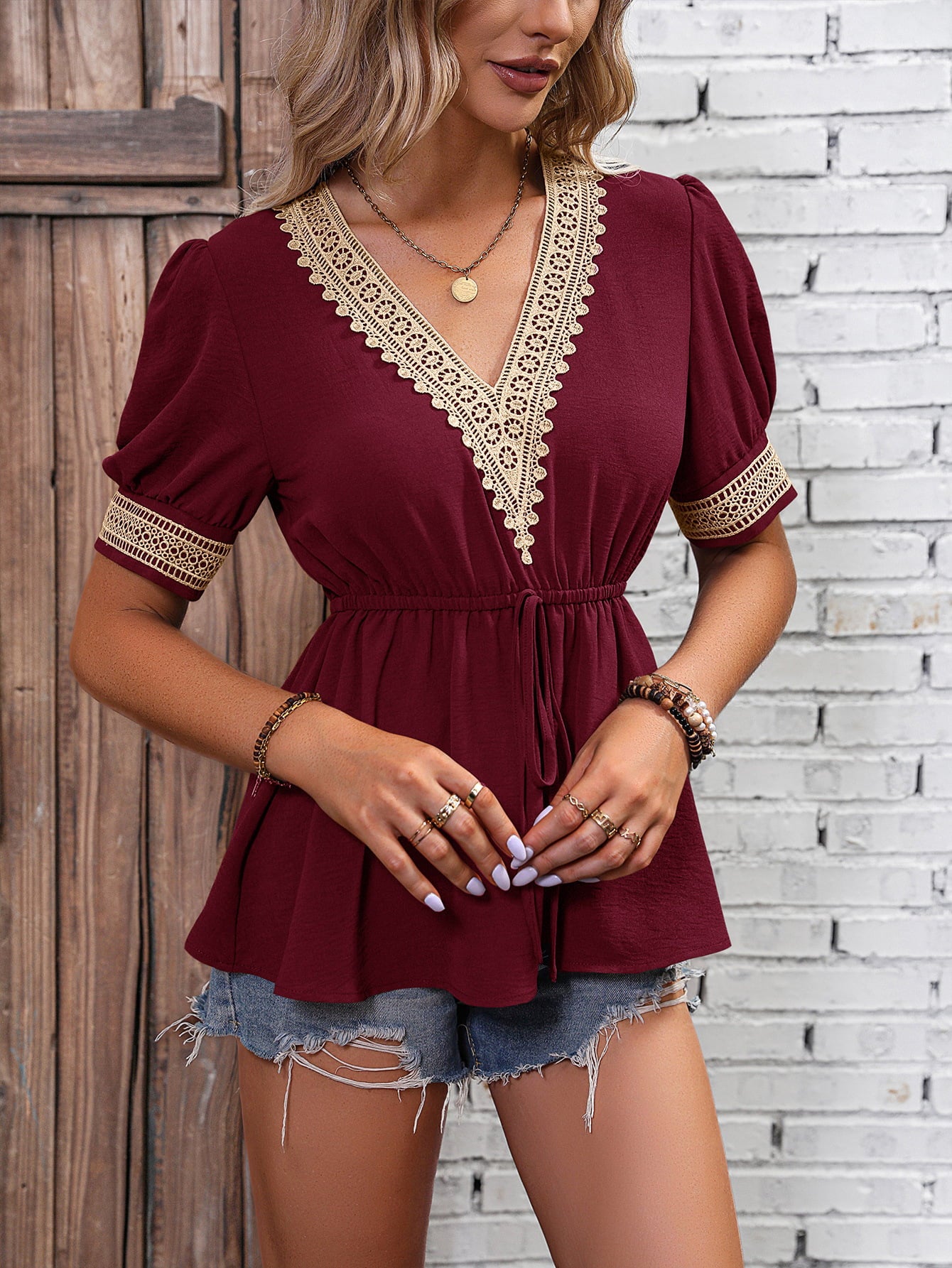 Wine contrast V-neck babydoll top with lace-trim neckline, puff sleeves, gathered waist tie