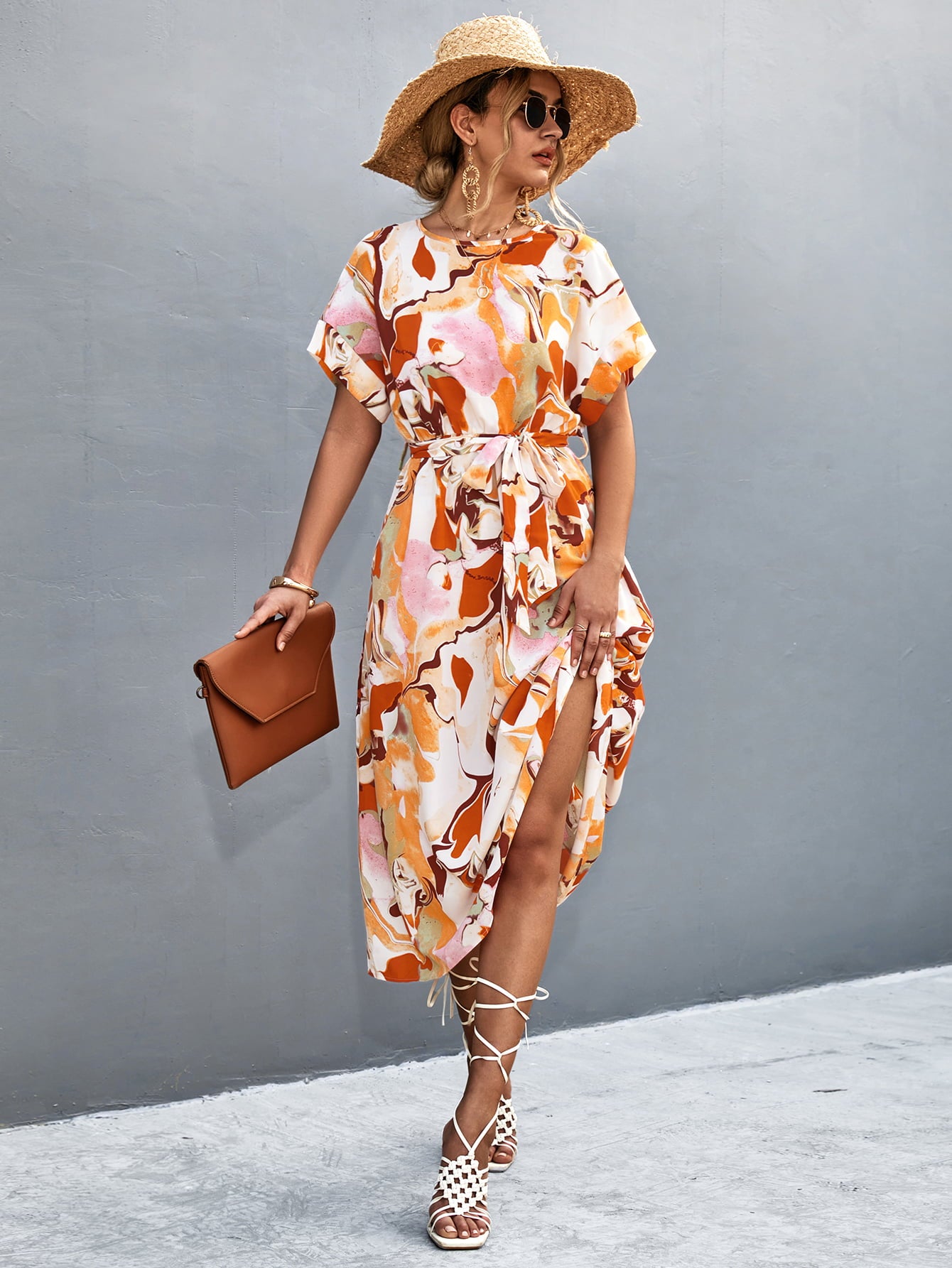 Orange, pink, and white abstract print midi dress, round neck, short sleeves, tie waist