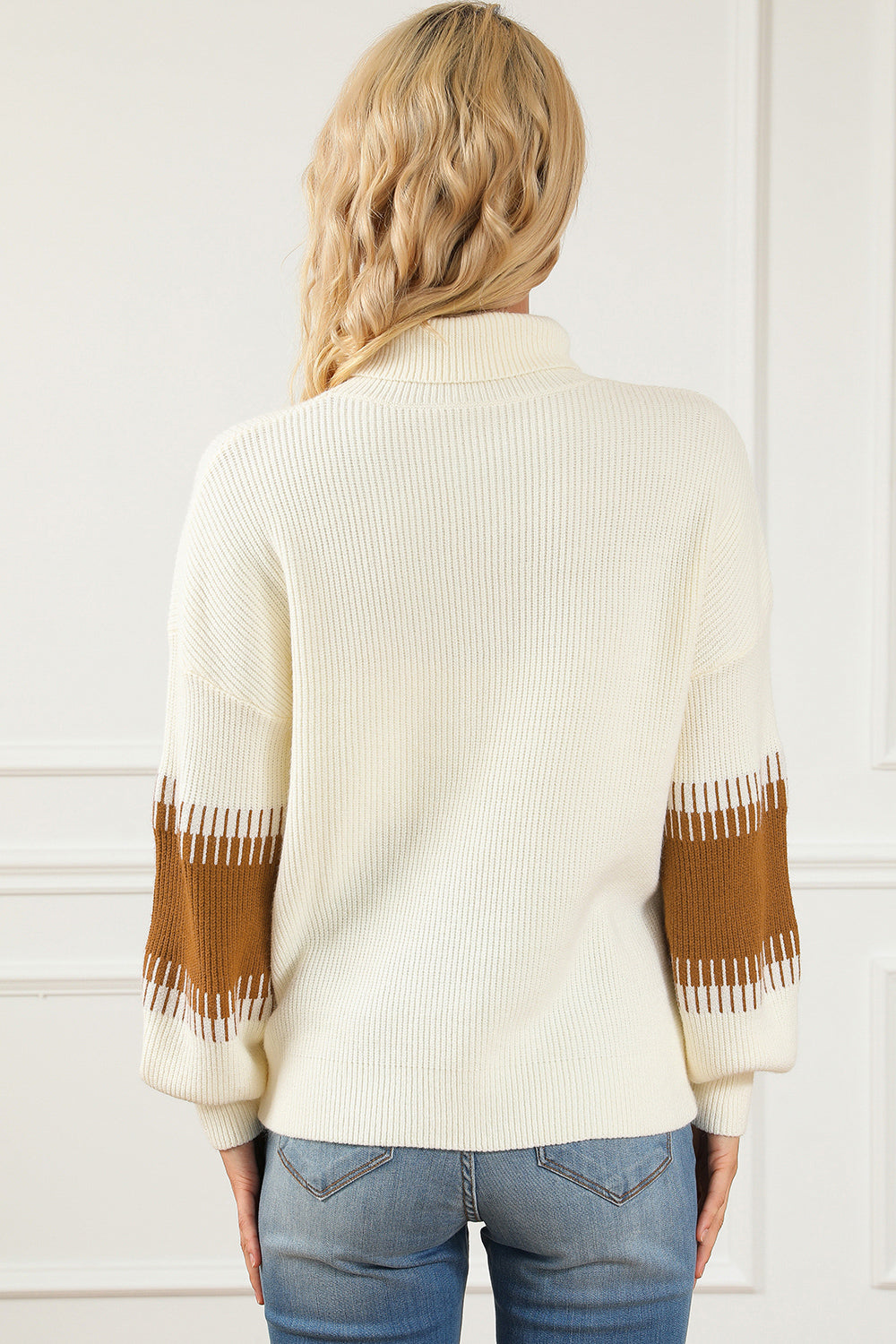 Cream knit turtleneck sweater with brown stripe on sleeves and back