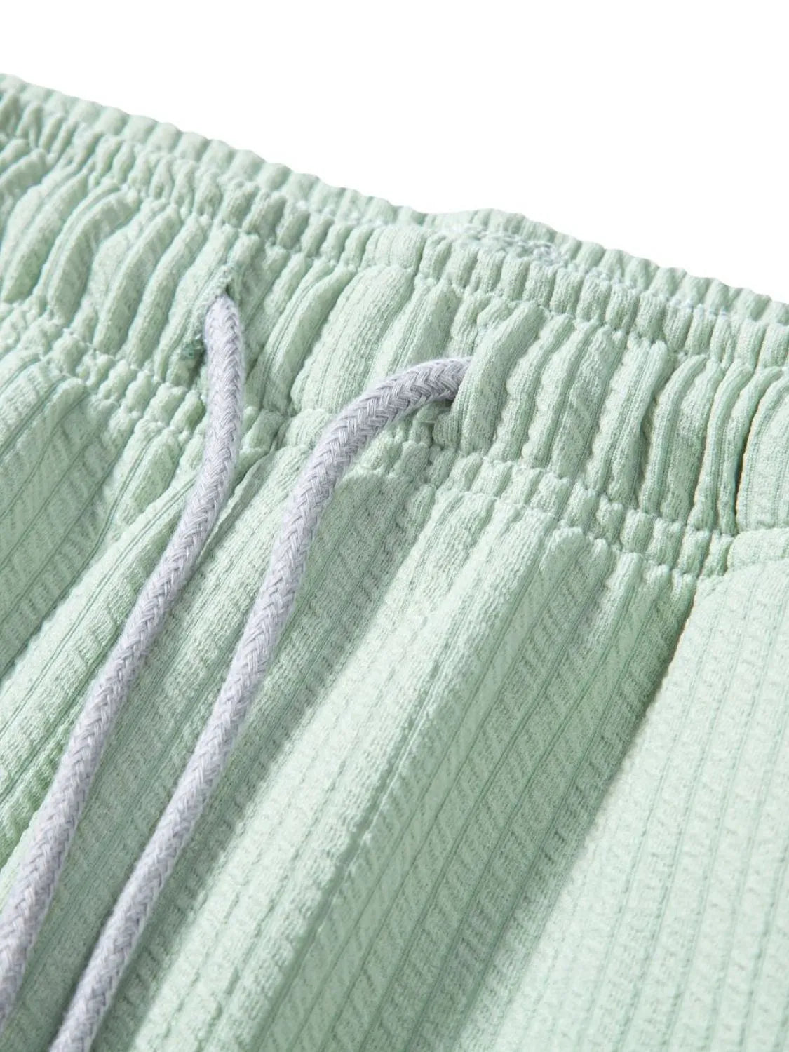 Mint green ribbed shorts with drawstring and elastic waistband
