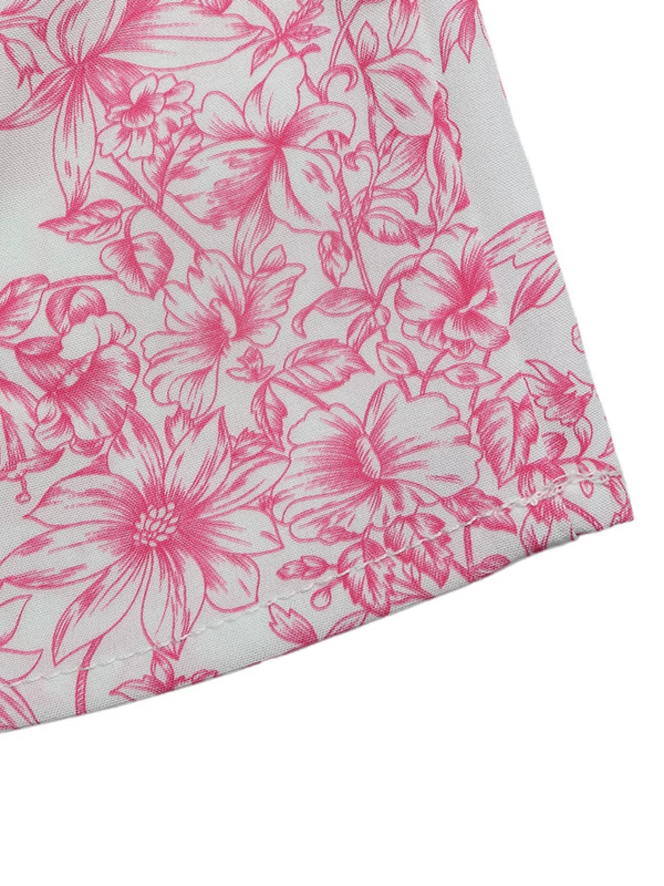 Cedar & Moore Floral Print Ruffle Sleeve Blouse with pink flowers on white fabric