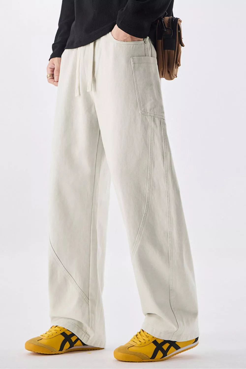 Men's off-white cotton drawstring waist jeans with front patch pocket