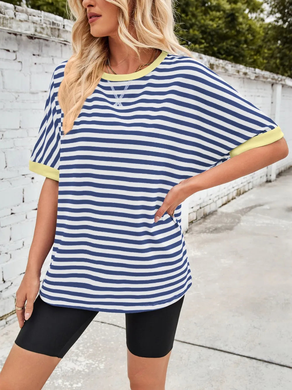 Blue and white striped round-neck half-sleeve T-shirt with yellow ribbed neckline trim