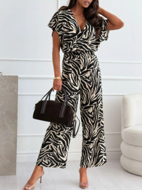 Zebra print wide-leg jumpsuit with V-neck, short sleeves, gathered waist