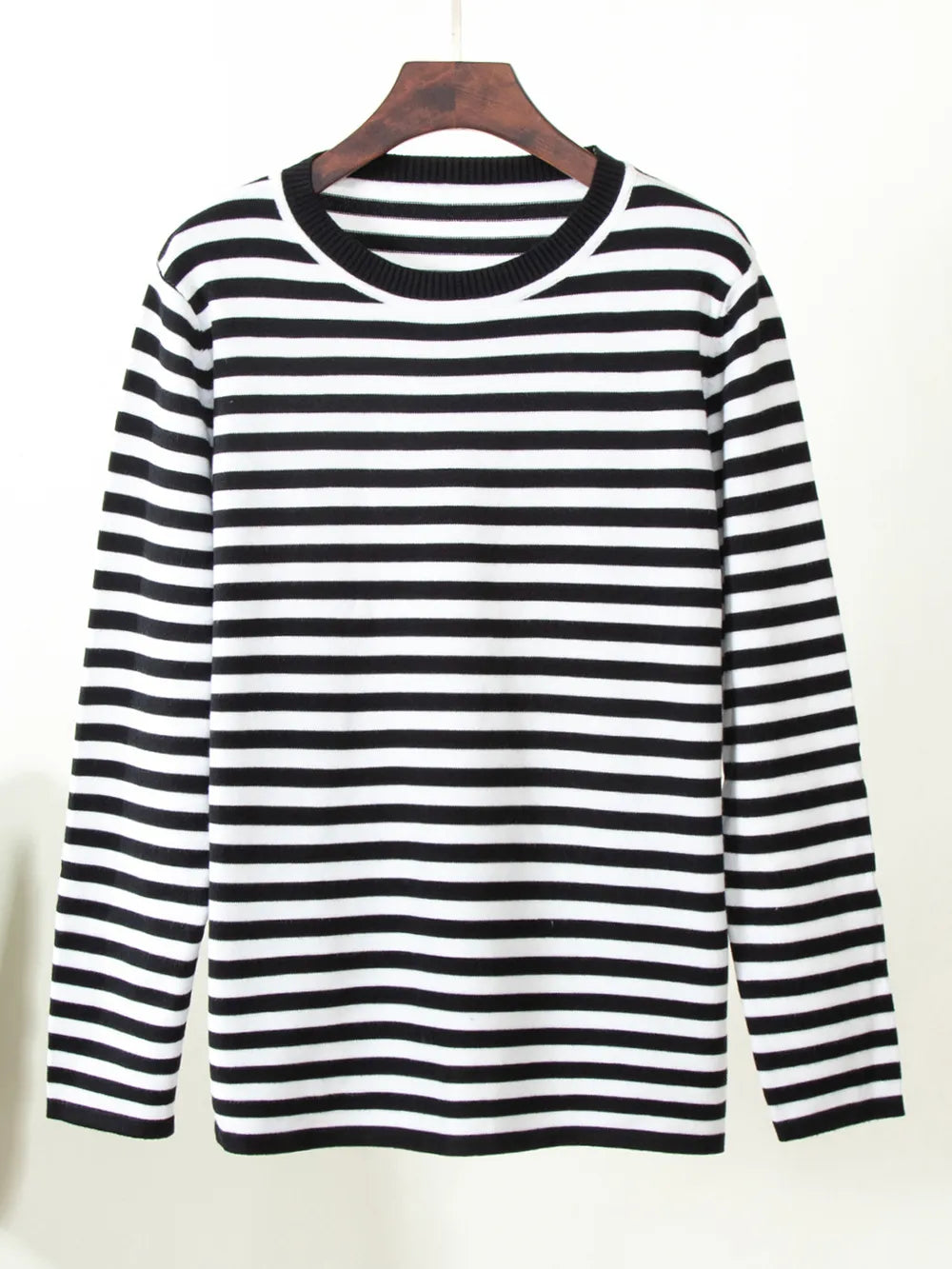 Striped long-sleeve sweater, black and white with crew round neck.