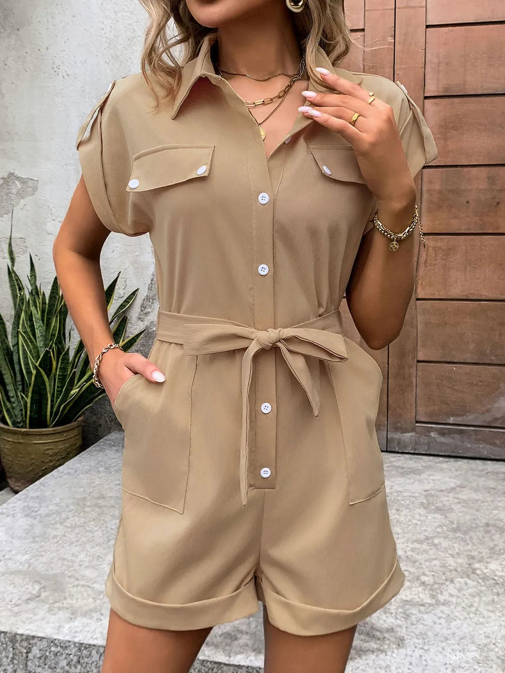 Camel collared button-front romper with tie waist and pockets, short sleeves