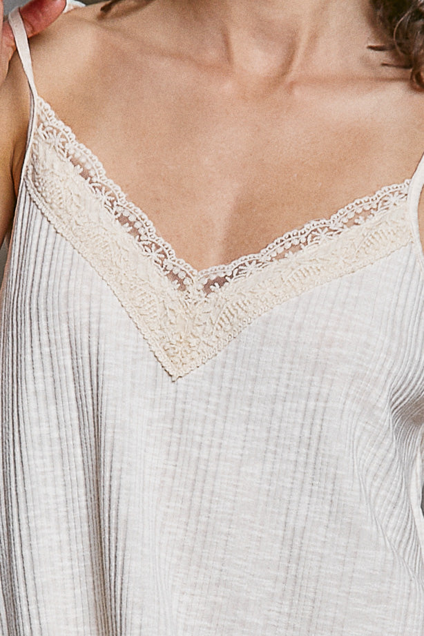 Almond lace V-neck trim on textured knit cami with thin spaghetti straps