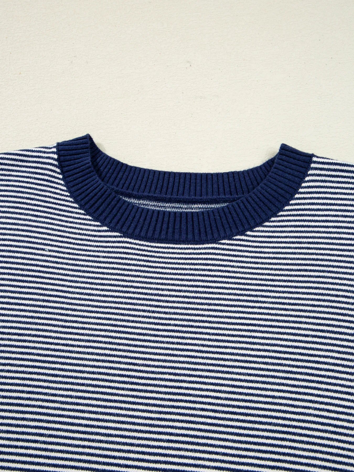 Navy and white striped knit tunic sweater neckline with ribbed crew collar