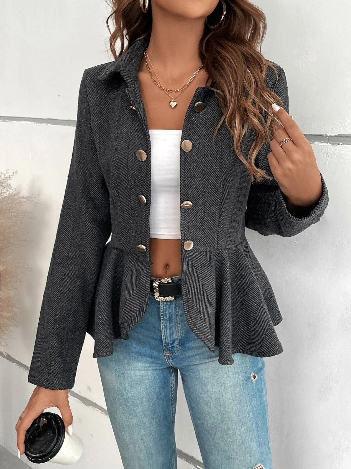 Dark charcoal collared blazer with ruffle peplum hem and gold buttons