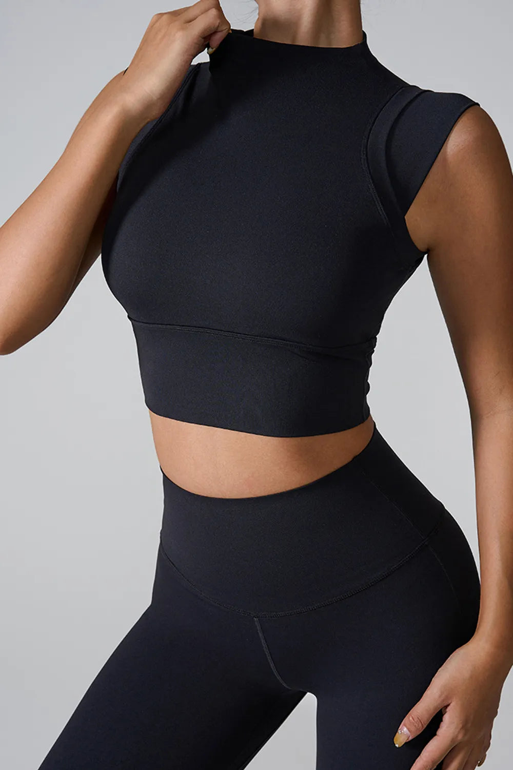 Black mock neck active tank, fitted cropped hem