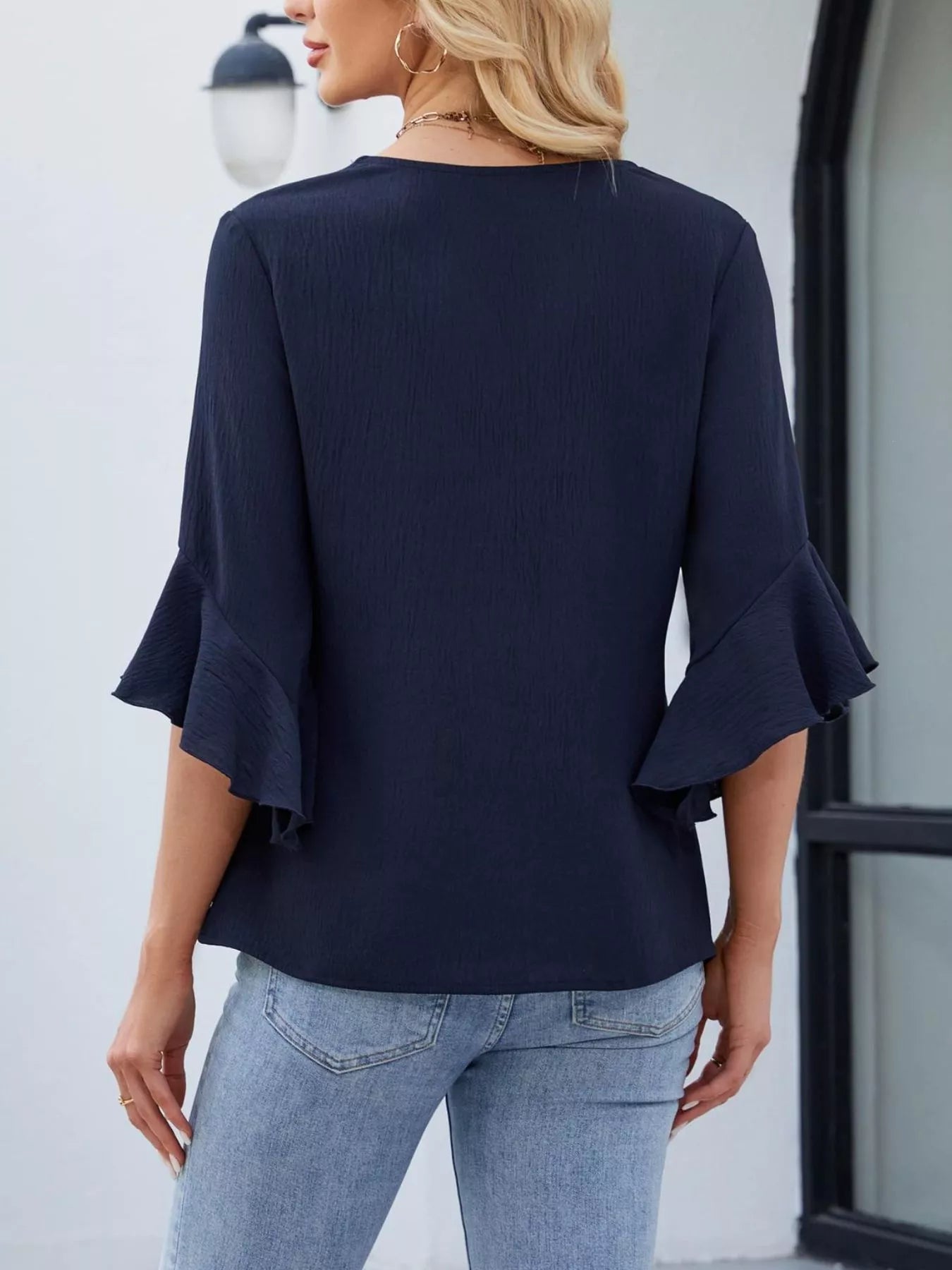 V-Neck Ruffle Sleeve Blouse by Trendsi, navy blue with flutter sleeves, back view