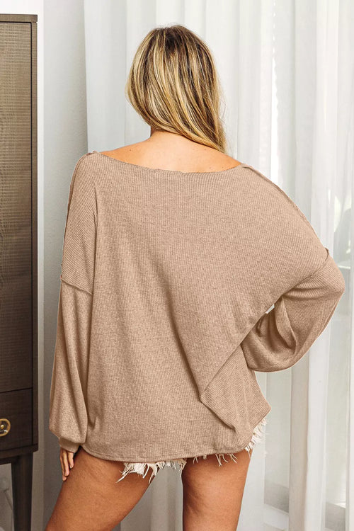 Taupe long sleeve top, back view with wide neckline and exposed seam detail