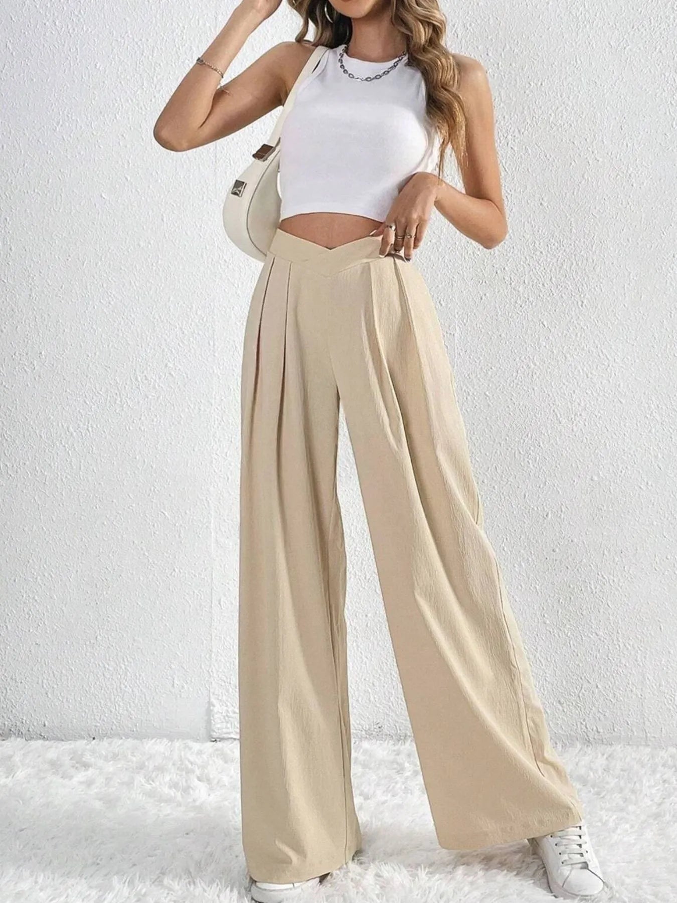 Beige wide-leg pants with ruched front V-waist detail