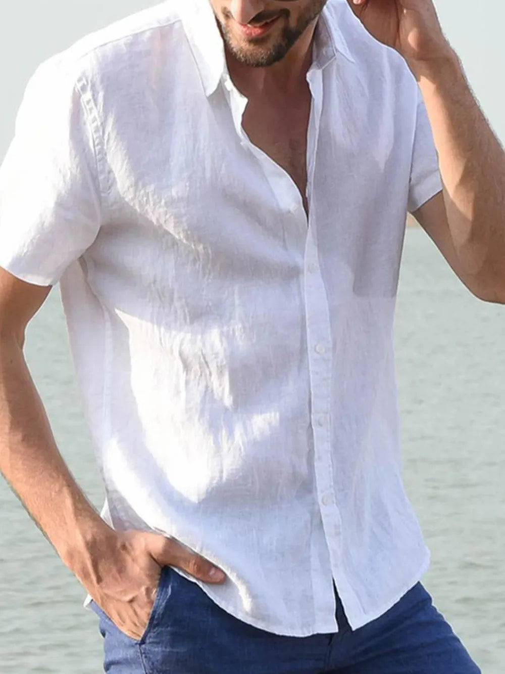 Men's short-sleeve button-down shirt, white, front view with button placket and collar