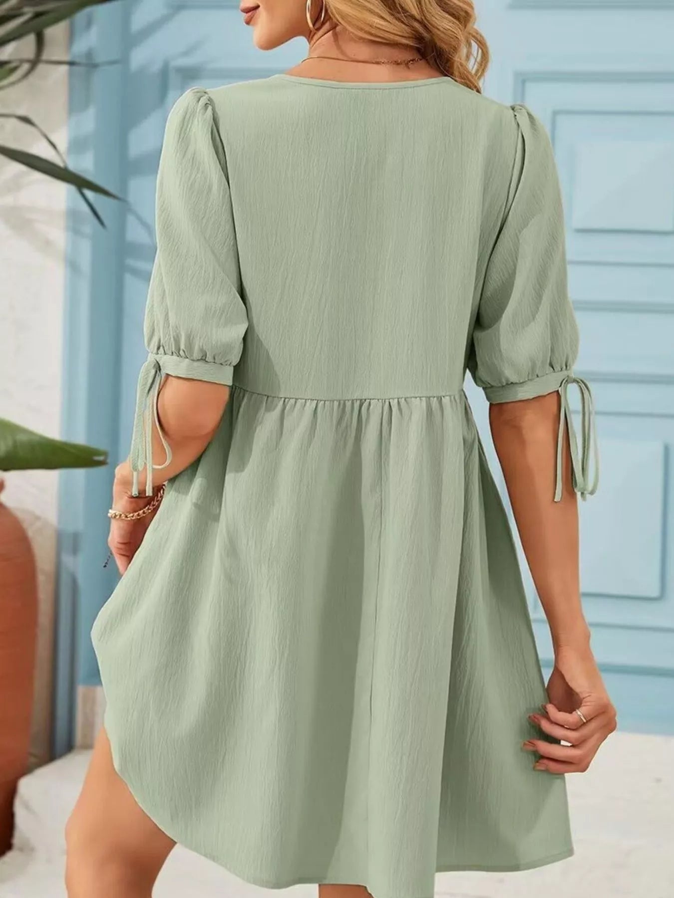 Tie-Neck Puff Sleeve A-Line Mini Dress in sage-green with tie-cuff sleeves