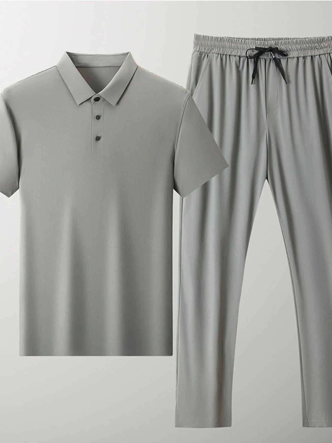 Men's light grey polo shirt and drawstring pants set, short sleeves, button placket