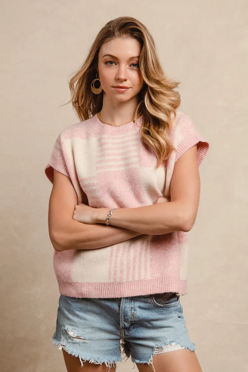 Blush and ivory checker-stripe knit sweater vest, crew neckline, ribbed trim at hem