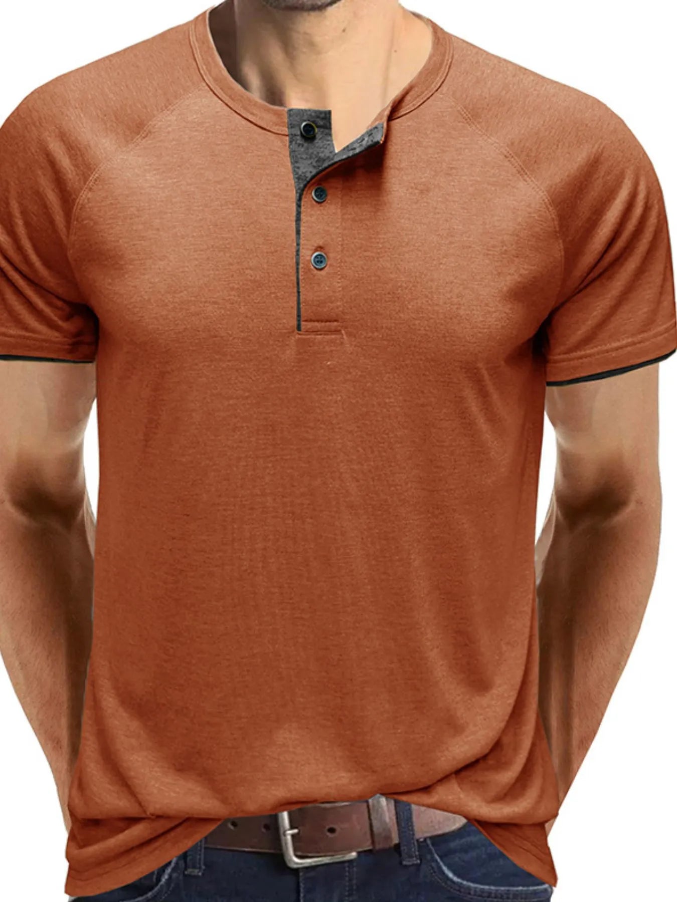 Caramel brown henley polo shirt with dark button placket and contrast trim.