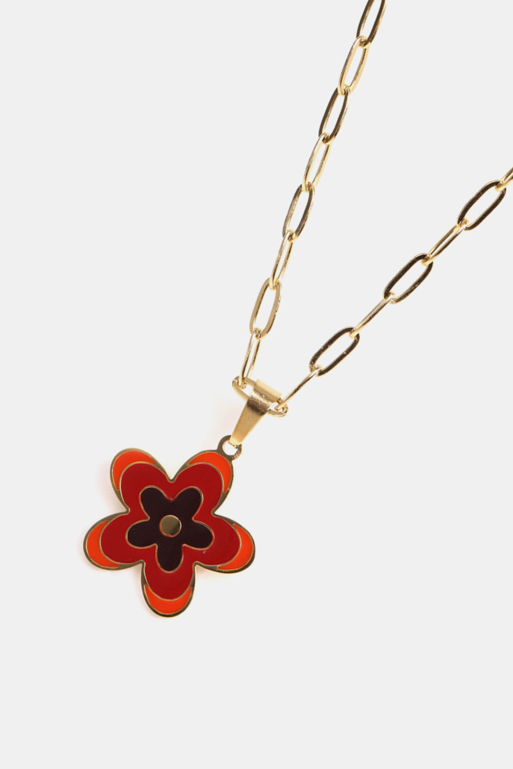 Gold-tone flower pendant necklace with red orange enamel petals and black center