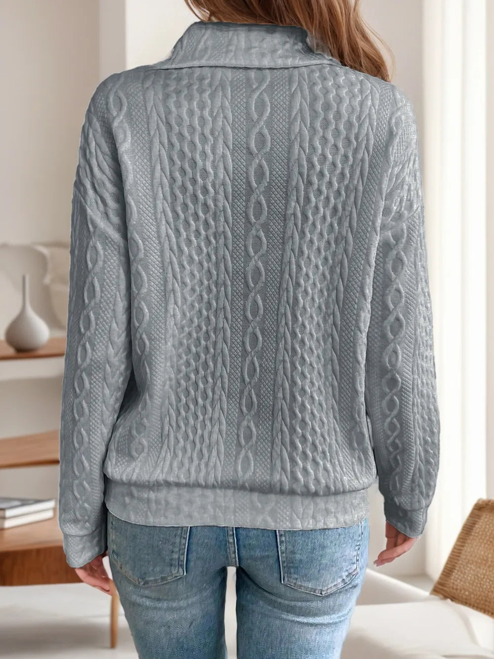 Dark gray long-sleeve sweatshirt back with collared neck and diagonal zipper detail