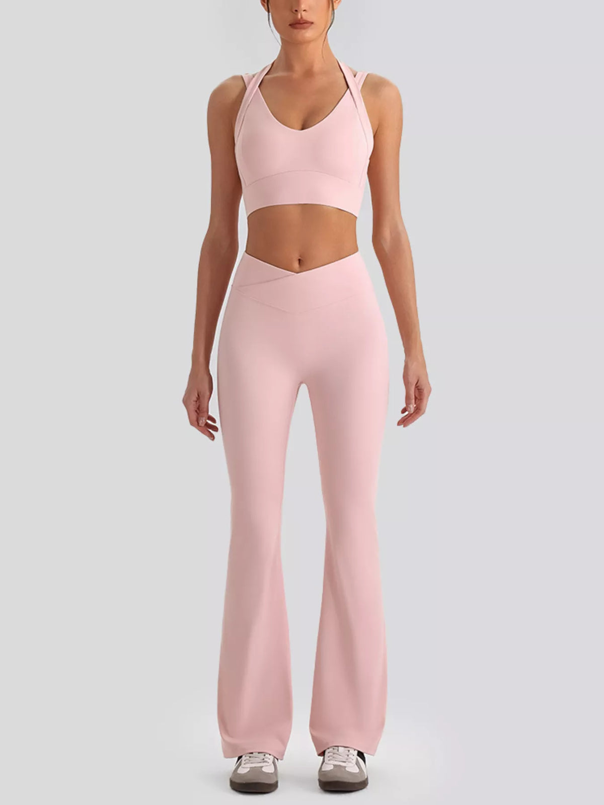 Light pink seamless v-neck tank and flared leggings set, full body