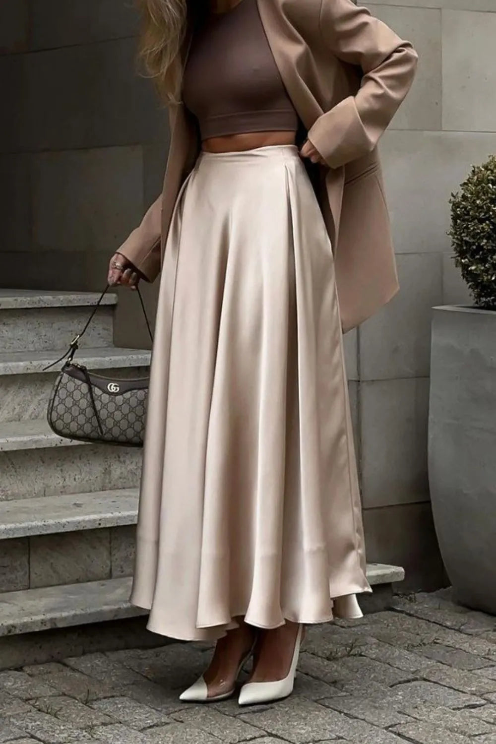 Khaki satin midi skirt with elastic back waist, gathered pleats and flared shape