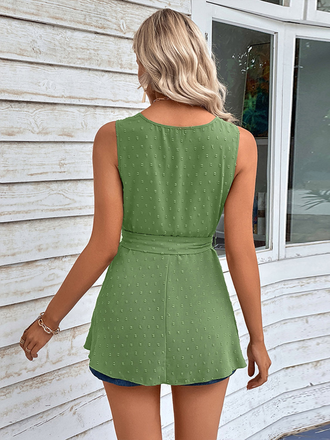 Mid green swiss dot tie-waist peplum tank top, sleeveless back view