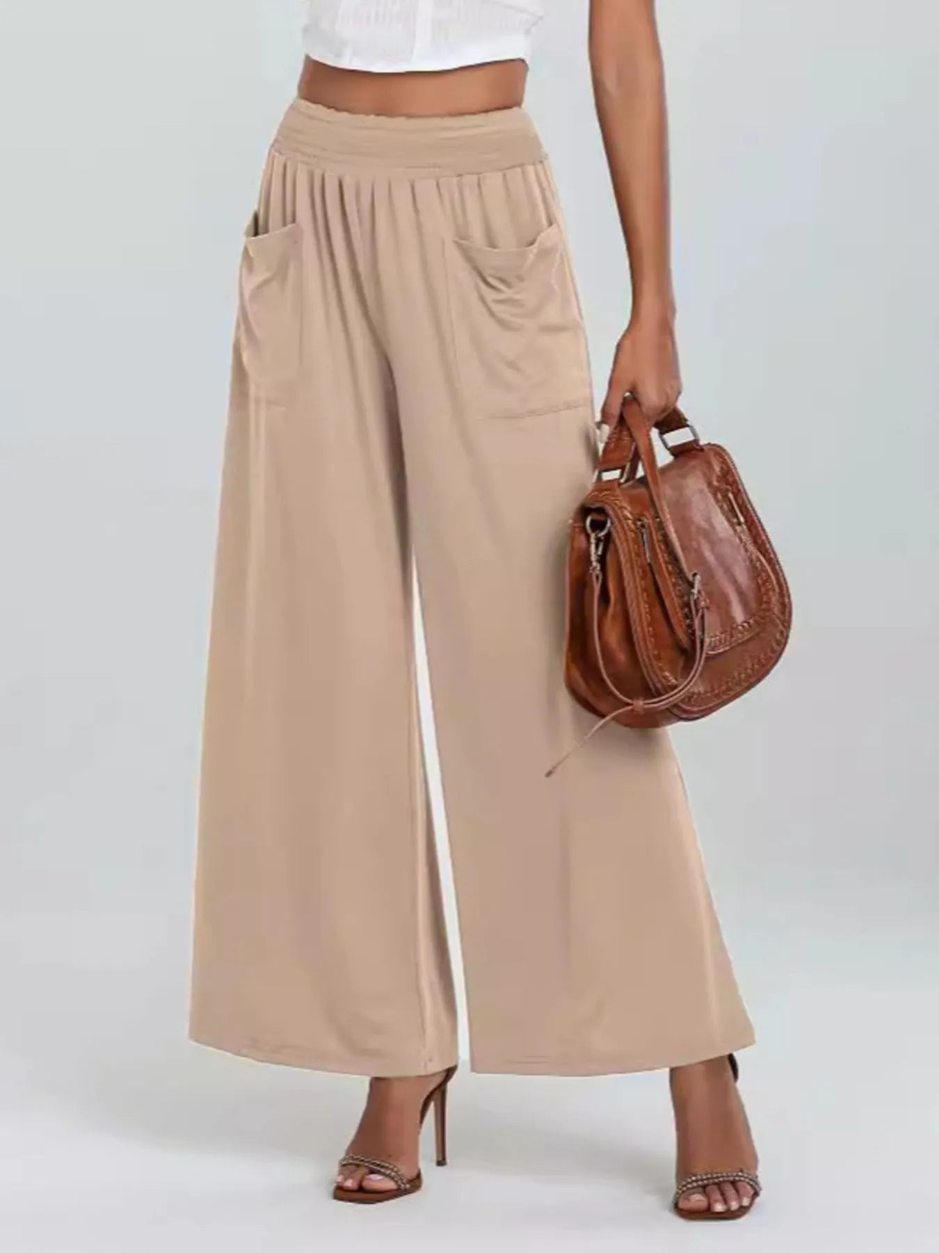Apricot high-waisted wide-leg pants with elastic waist and side pockets